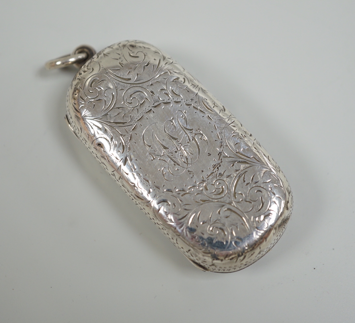 A late Victorian engraved silver twin sovereign case, William Neale, Chester, 1896, 57mm.